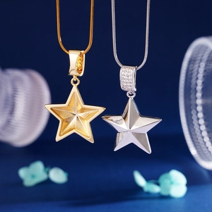 Elegant gold and silver star pendants with sparkling zircon on minimalist snake chains