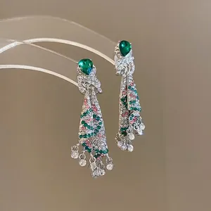 Retro luxury drop earrings with emerald gemstones and colorful rhinestone tassels