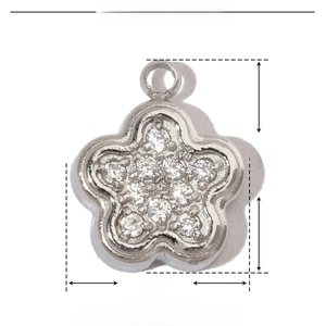 Macro shot of 9x8mm silver flower pendant with stainless steel and zircon details