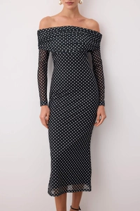 Detailed view of polka dot mesh sleeves and elegant ruched off-shoulder neckline design