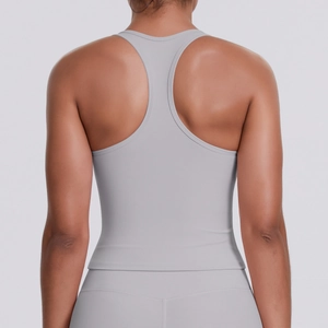 Detailed back view of a grey racerback sports vest showing the matte seamless fabric