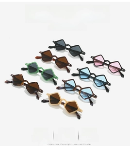 Matrix display of multi-colored geometric pentagon sunglasses in a minimalist layout