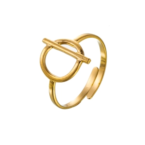 Macro detail of 18k gold plated stainless steel ring featuring star and sun layered design