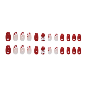 24pcs cow print press-on nails with red heart patterns and 3D bowknot accents