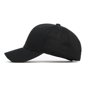 Detail of black cotton baseball cap showing cross embroidery and twill texture