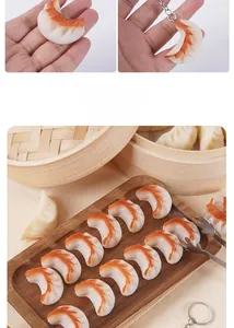 Macro shot of realistic PVC fried dumpling keychain showing texture and golden browning