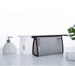 Detail of waterproof mesh toiletry bags with zipper closure and transparent design
