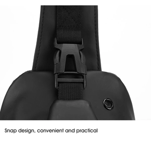 Close-up of black plastic snap buckle design on matte waterproof motorcycle sling bag
