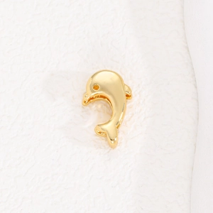 Detailed close-up of a glossy gold dolphin-shaped pendant for 10mm mesh bracelet