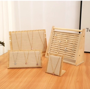 Linen jewelry display stands for necklaces and rings with minimalist wooden frames