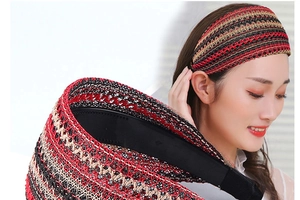Detailed macro of the breathable mesh woven headband with mixed red and black fabric textures