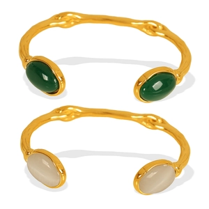 Retro 18k gold plated stainless steel open bangle with oval cat eye stone accents