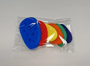 Detailed view of six colorful silicone sensory fidget stones with varied textures in a clear bag