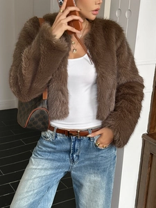 Detail shot of brown plush faux fur open front cardigan jacket showing soft texture