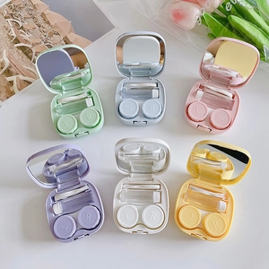 Portable macaron color contact lens cases set in six pastel shades with mirror and tools
