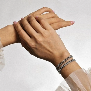Silver cuban chain bracelet for men with stacked metal link design on wrist