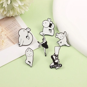 Set of 6 cute ballet rabbit and dancer enamel pins on a minimalist floral background