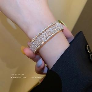 Elegant multi-layer beaded bracelet with sparkling rhinestones and white glass beads