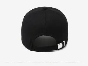 Detail of the black wool baseball cap featuring an adjustable silver metal buckle at the back