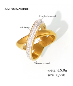 Macro detail of Bohemian 18k gold plated criss-cross ring with Czech diamond setting