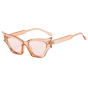 Fashionable cat-eye Y2K sunglasses with transparent orange frame and pink tinted lenses