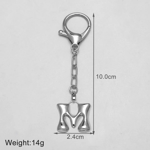 Detail of silver letter M keychain with 10cm height dimensions and lobster clasp