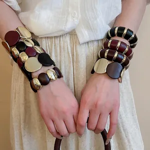 Chic acrylic oval patchwork elastic bracelets in gold, burgundy, and matte black set