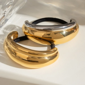 Minimalist double-layer black hair ties with polished gold and silver crescent metal arcs
