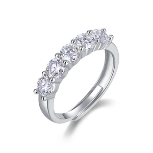 Detailed close-up of a silver five-stone adjustable ring with sparkling round-cut gems