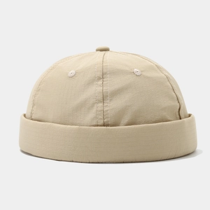 Minimalist beige docker cap in quick-dry ripstop fabric with stylish contrast stitching