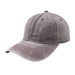 Detailed view of reinforced stitching on the brim of a vintage washed baseball cap