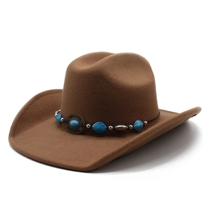 Classic brown western cowboy hat in wool felt with turquoise bead trim and curved brim