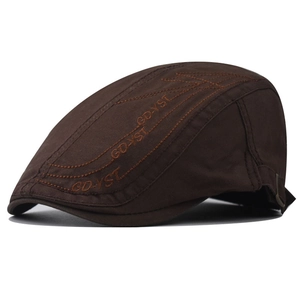 Detailed side view of brown cotton ivy cap featuring high-quality GD-YST embroidery