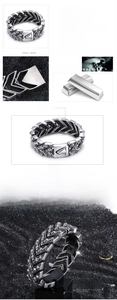 Detailed view of heavy stainless steel biker bracelet with 316L stamp and skull engraving