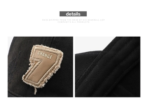 Close-up of leather patch 7 and CHANGE embroidery with fleece trim on black baseball cap
