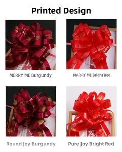 Detail view of large red and burgundy wedding car mirror bows with Marry Me and Xi prints