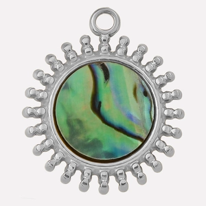Macro view of sun pendant featuring natural abalone shell and stainless steel frame