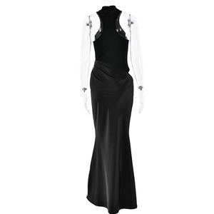 Back view of black halter mermaid dress featuring waist pleats and a concealed zipper