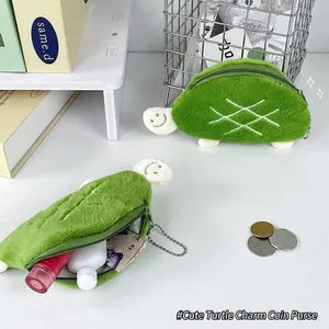 Green plush turtle coin purse with embroidered shell detail and metal bead chain