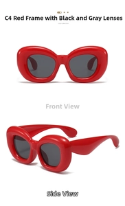 Detail of red puffy bubble sunglasses showing the bold frame and dark grey lenses