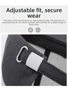 Detail of adjustable silver metal buckle on dark grey baseball cap for custom fit