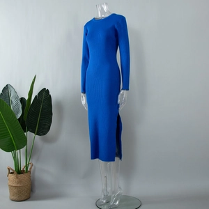 Detail view of the ribbed knit texture and side slit on the blue slim fit dress