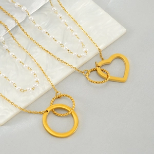 Colliers double couche en or avec perles et pendentifs cœur et cercle de style français