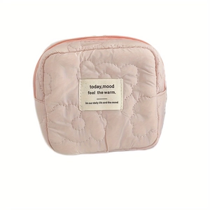 Compact pink quilted floral organizer bag with soft texture and secure top zipper