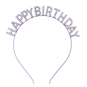 Detailed view of purple metal headband with rhinestone-encrusted Happy Birthday lettering