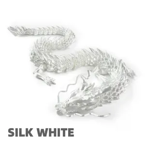 Macro detail of 3D printed articulated dragon with silk white finish and textured scales