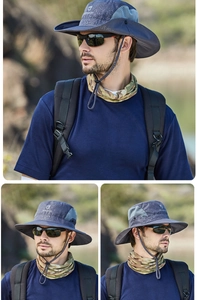 Detail of wide brim sun hat showing breathable side mesh and adjustable chin strap