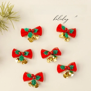 Set of 6 red velvet Christmas bows with green leaves and gold bells for holiday decor