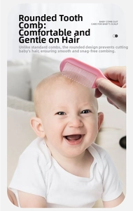 Pink baby hair comb with round-tip bristles for gentle infant scalp massage and grooming