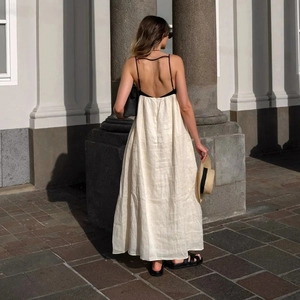 Bohemian beige linen maxi dress with backless crisscross straps for beach vacations